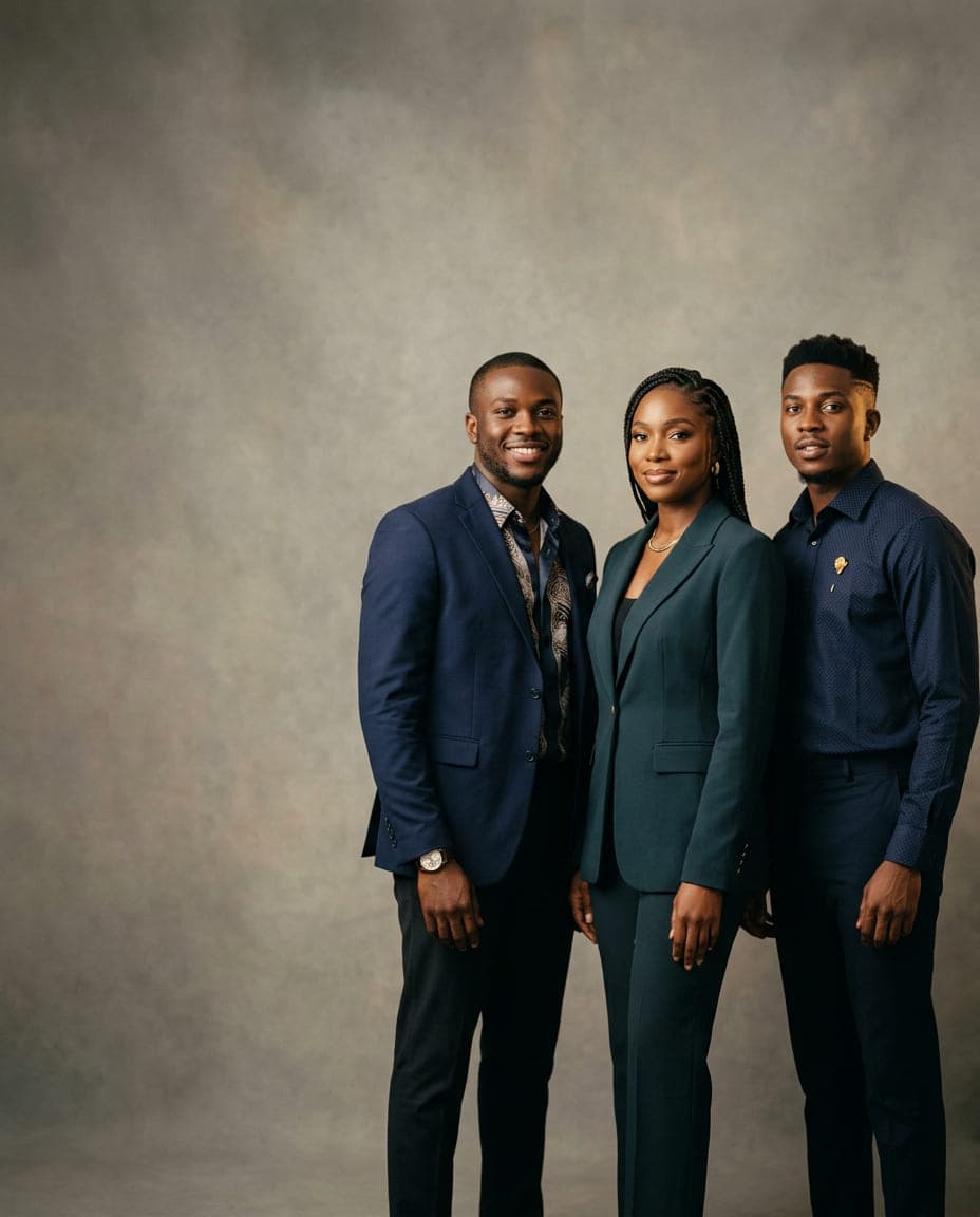 Three young Nigerian professionals standing together